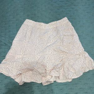 A light pink cheetah skirt with elastic waist band in great condition size small